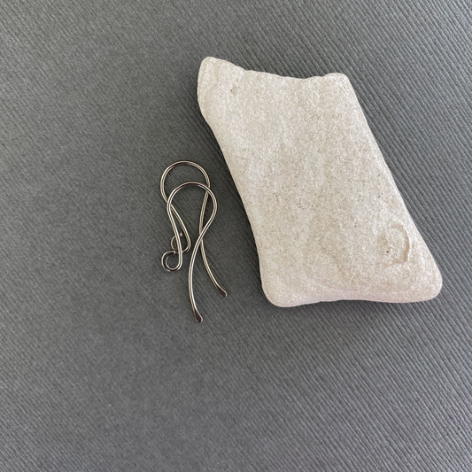 A pair of handmade 14K Palladium White Gold earring wires with a hammered front loop, displayed against a neutral background.