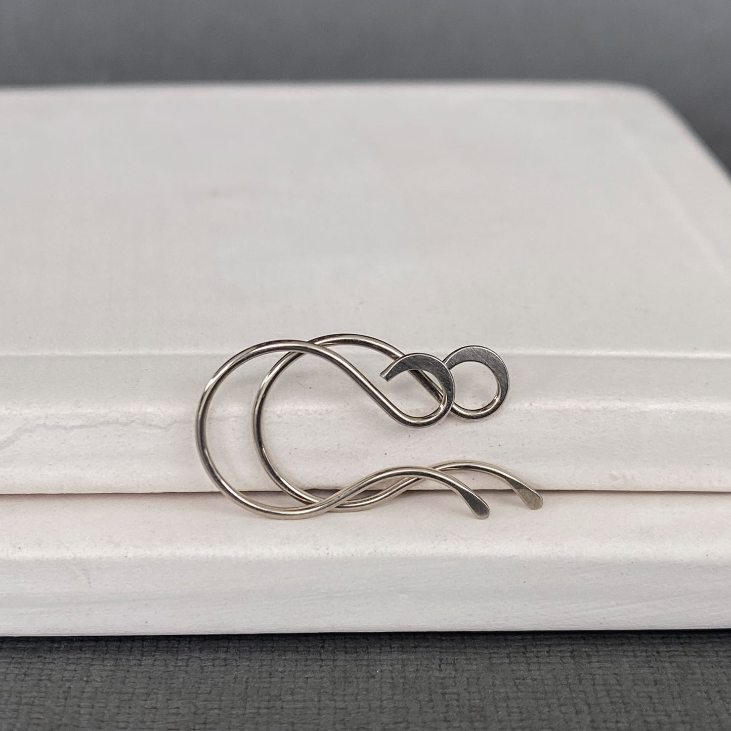 Side view of handcrafted 14k Palladium White Gold ear wires with hammered loops