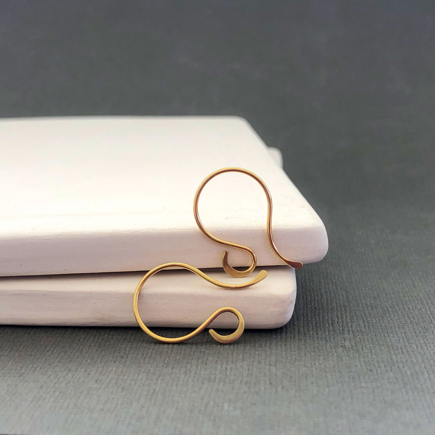 18k solid gold French hook ear wires close-up view