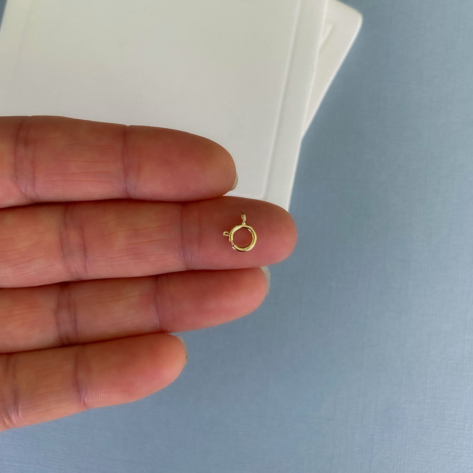 Small 6mm spring ring clasp in solid 14k yellow gold, perfect for fine jewelry