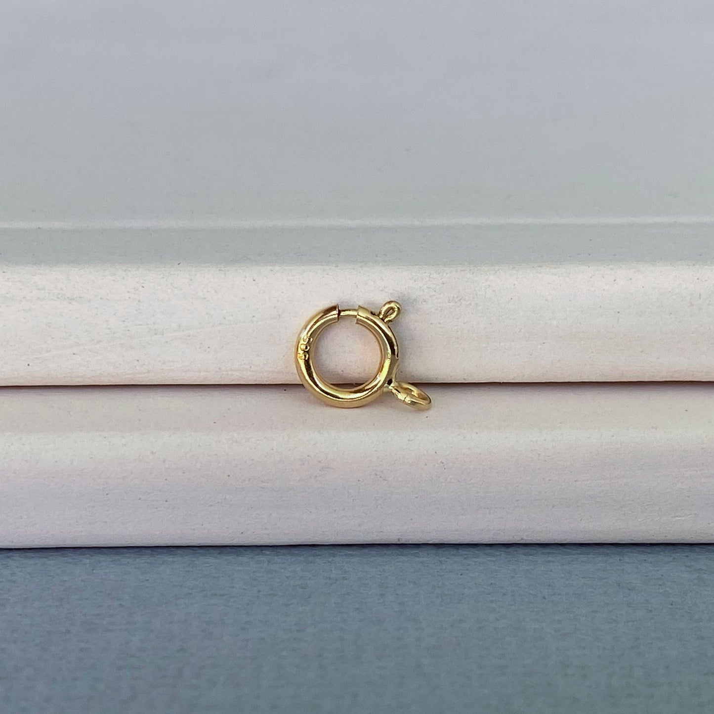 Essential jewelry finding: Italian-made 14k gold spring ring clasp for necklaces and bracelets