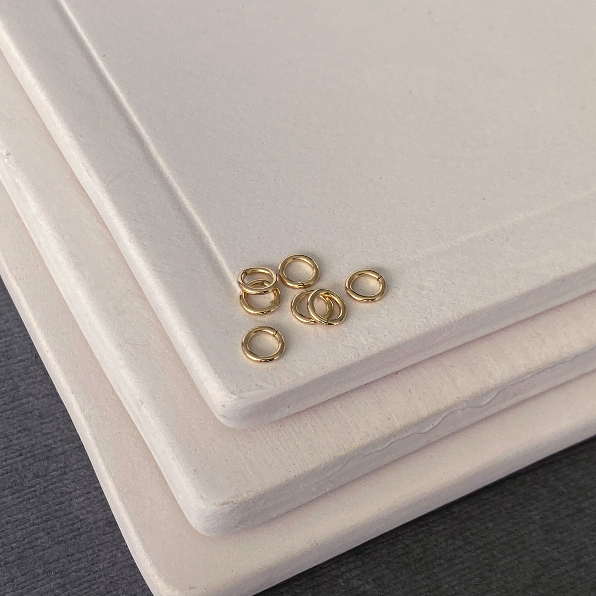 Fine jewelry components – solid gold jump rings in 3mm size, made for professional-quality designs.