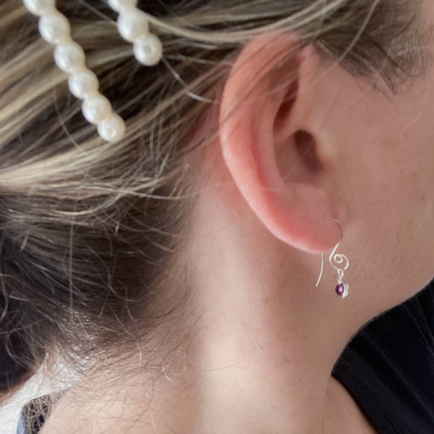 model wearing handmade spiral interchangeable earring hooks