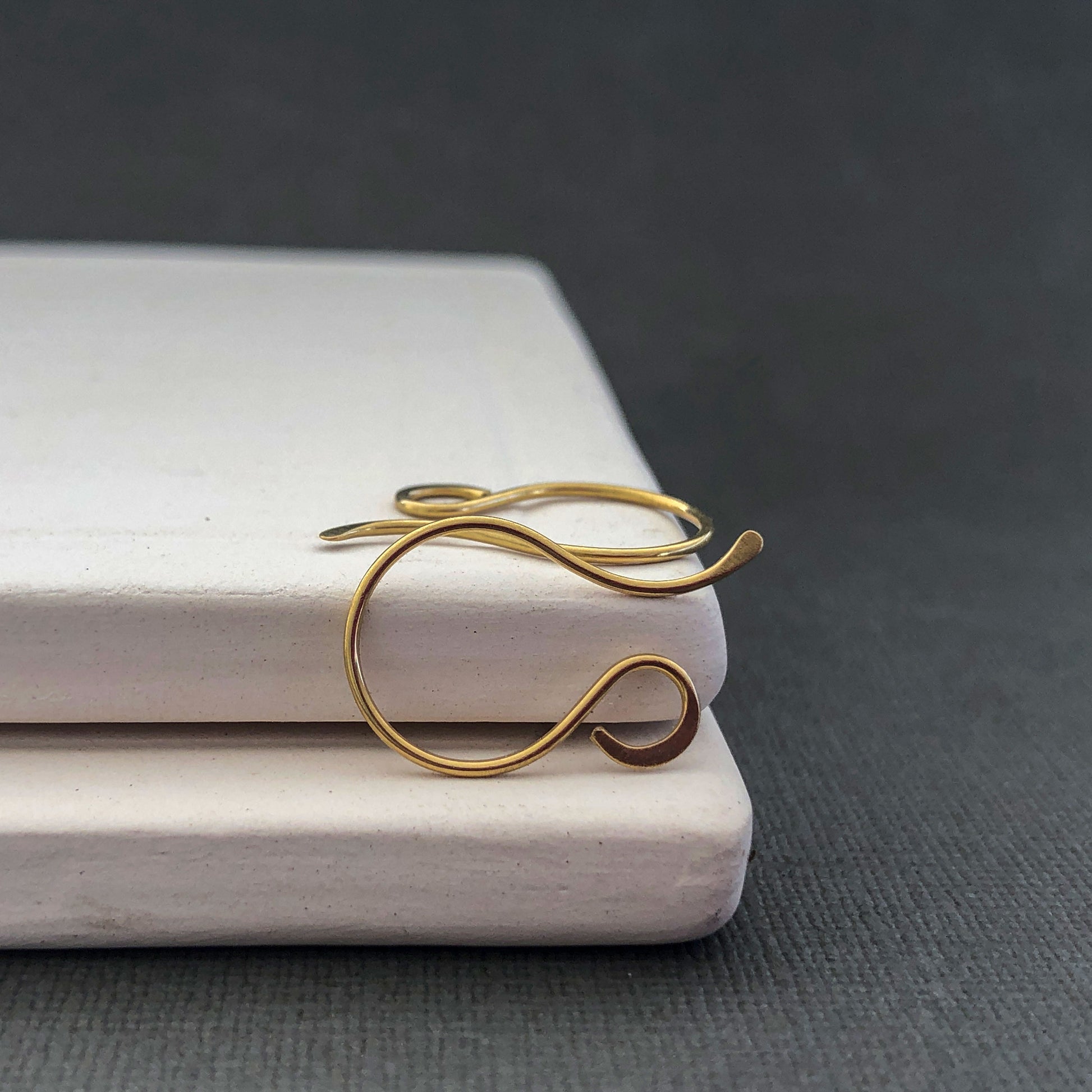 Polished 18k solid gold earring hooks with subtle shine