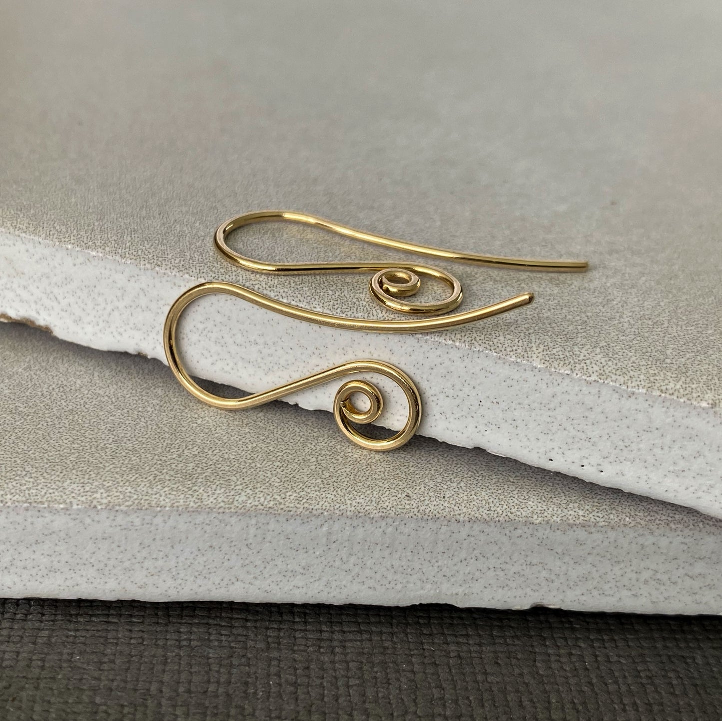 Secure-fitting 10K solid gold spiral earring hooks, designed for comfort and lasting wear.
