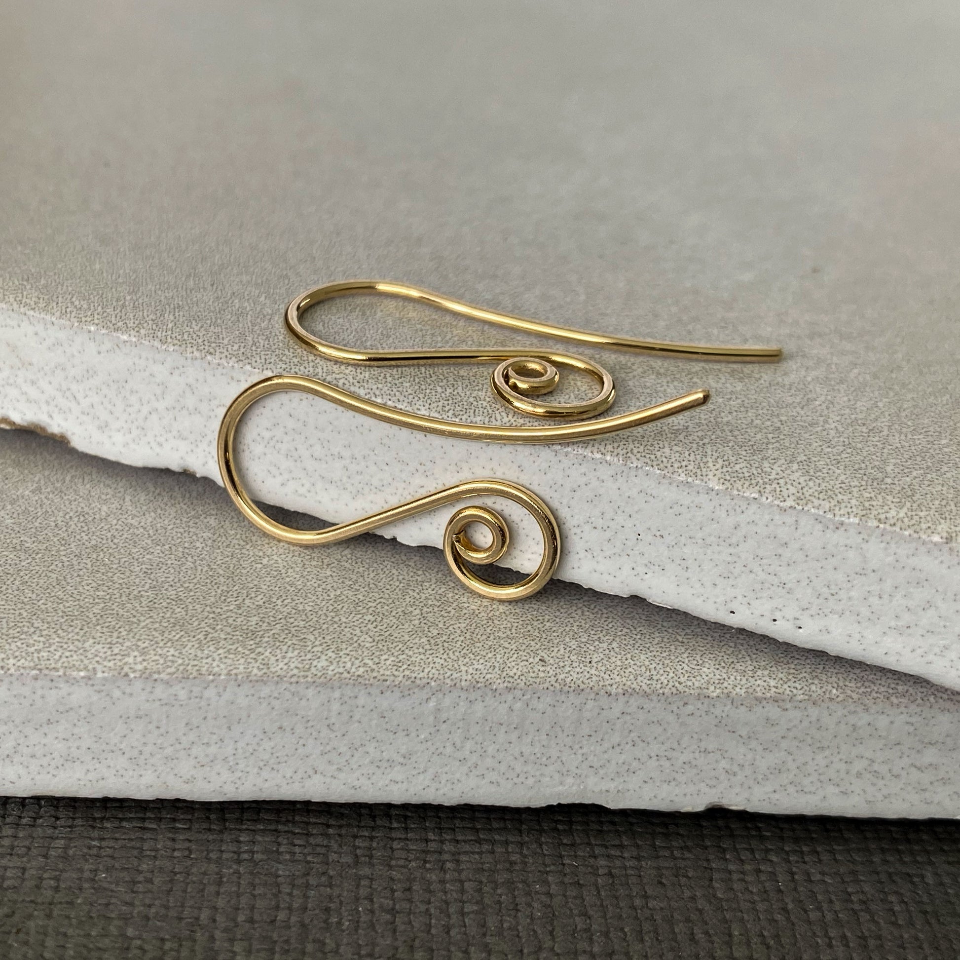 Secure-fitting 10K solid gold spiral earring hooks, designed for comfort and lasting wear.