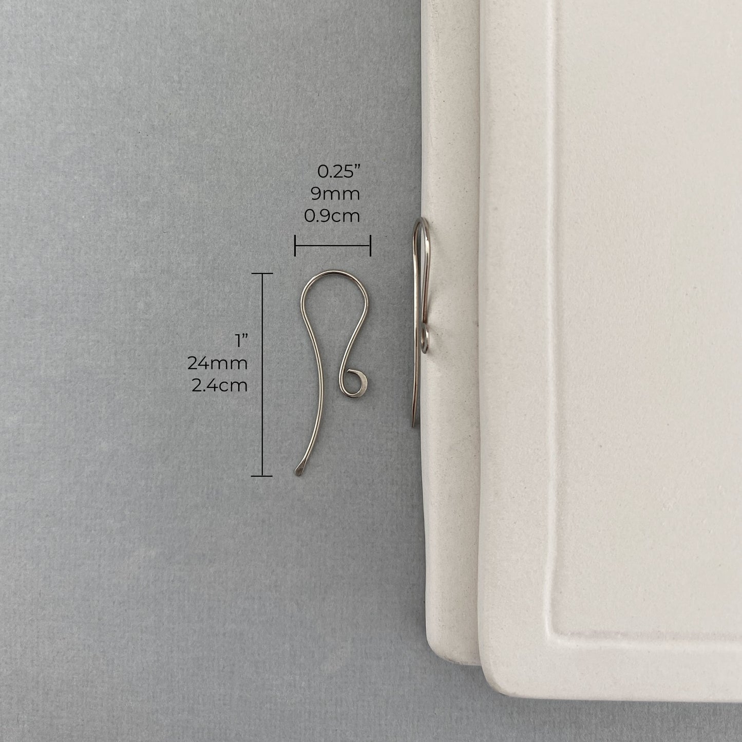 Solid gold earring hooks used as jewelry findings for custom designs