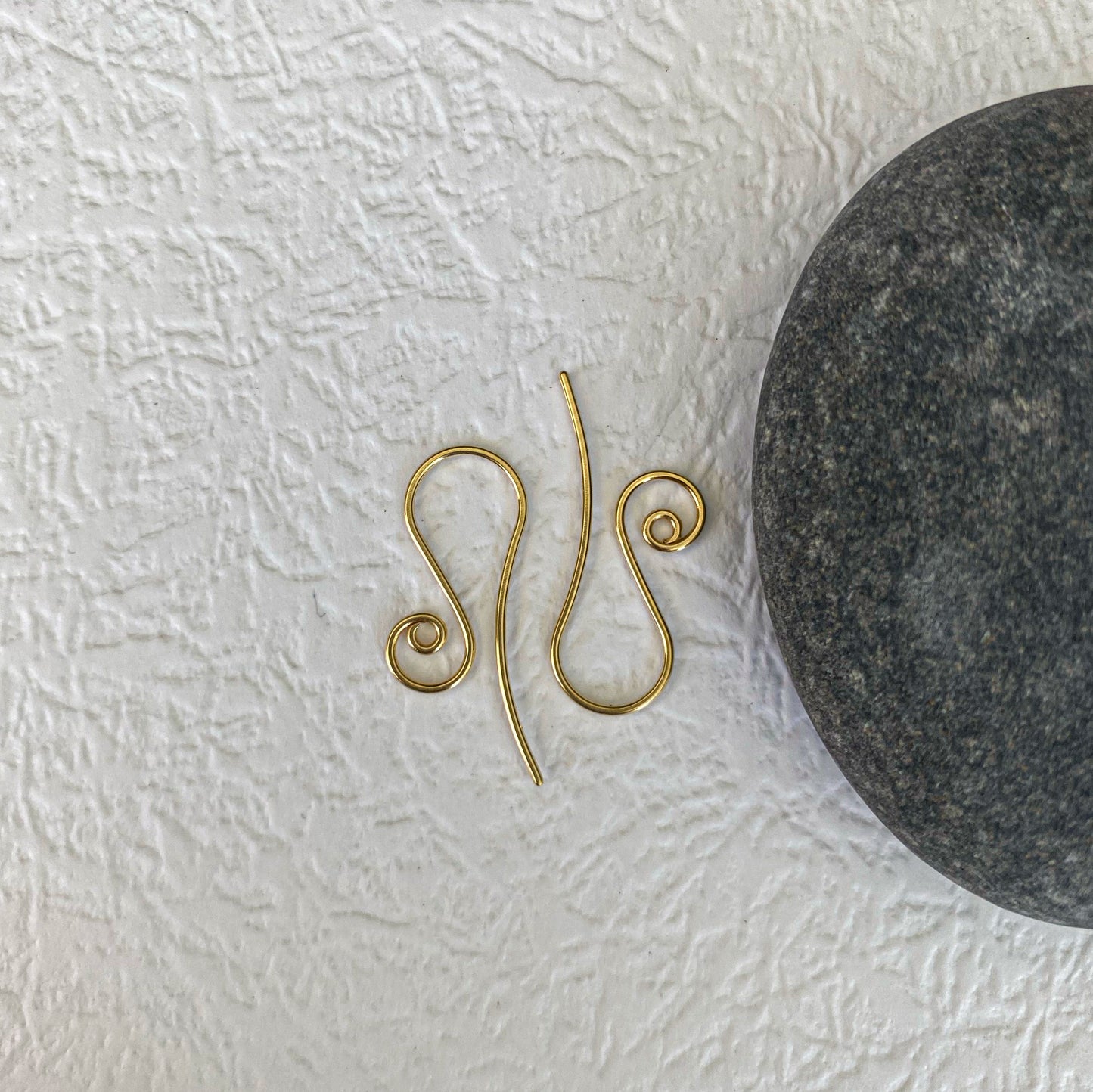 Sturdy thick 18k gold ear wires in a classic spiral style for heavy earrings