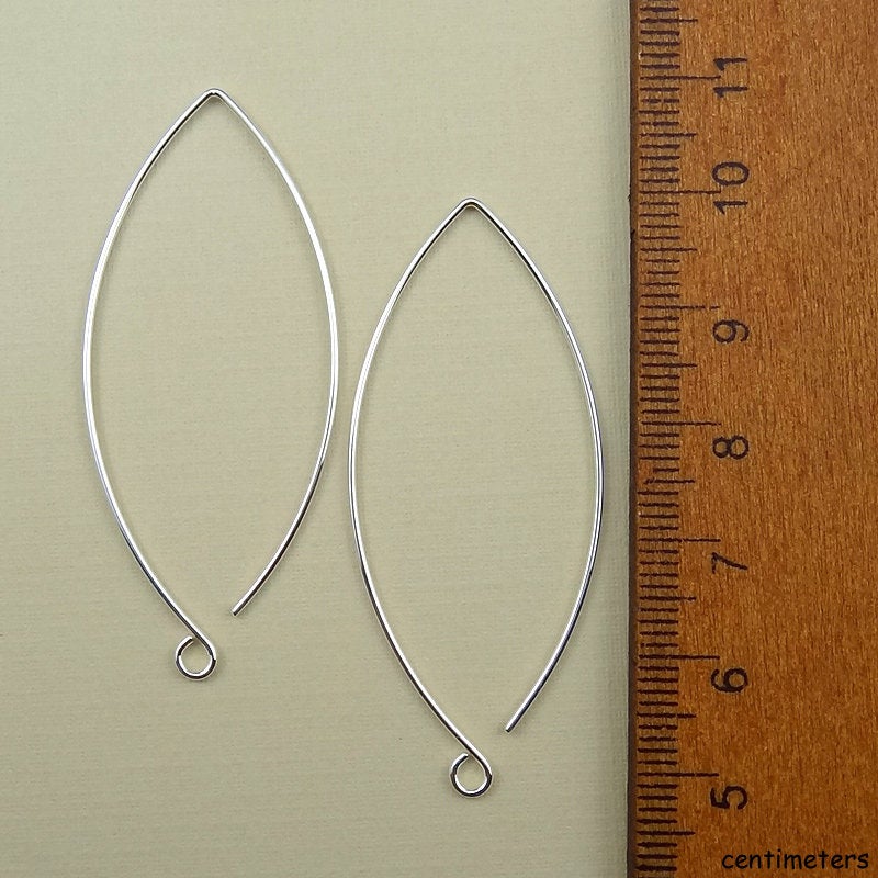 sterling silver earring hooks that are oblong or almond shape with a loop facing outward 2" long