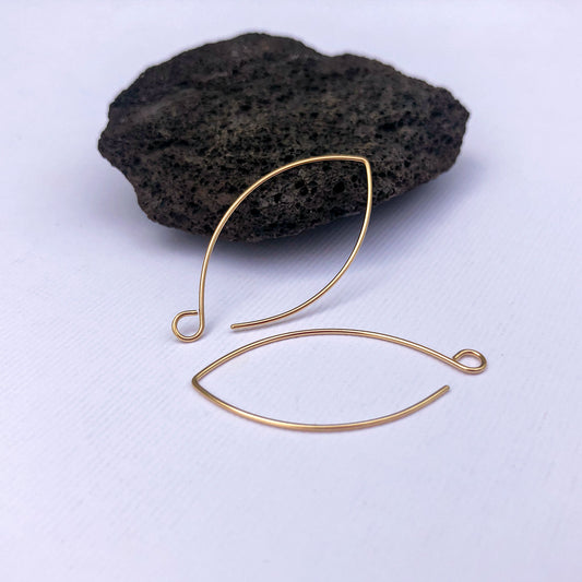 Handmade solid gold marquise ear wires in 14k gold, shown on white background.