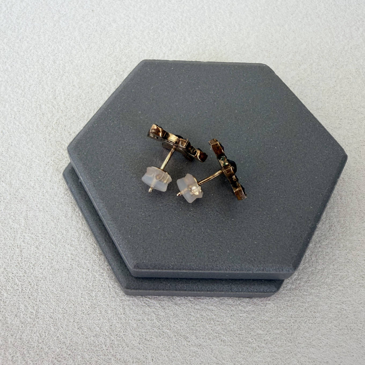14K solid gold silicone earring backs viewed from the side