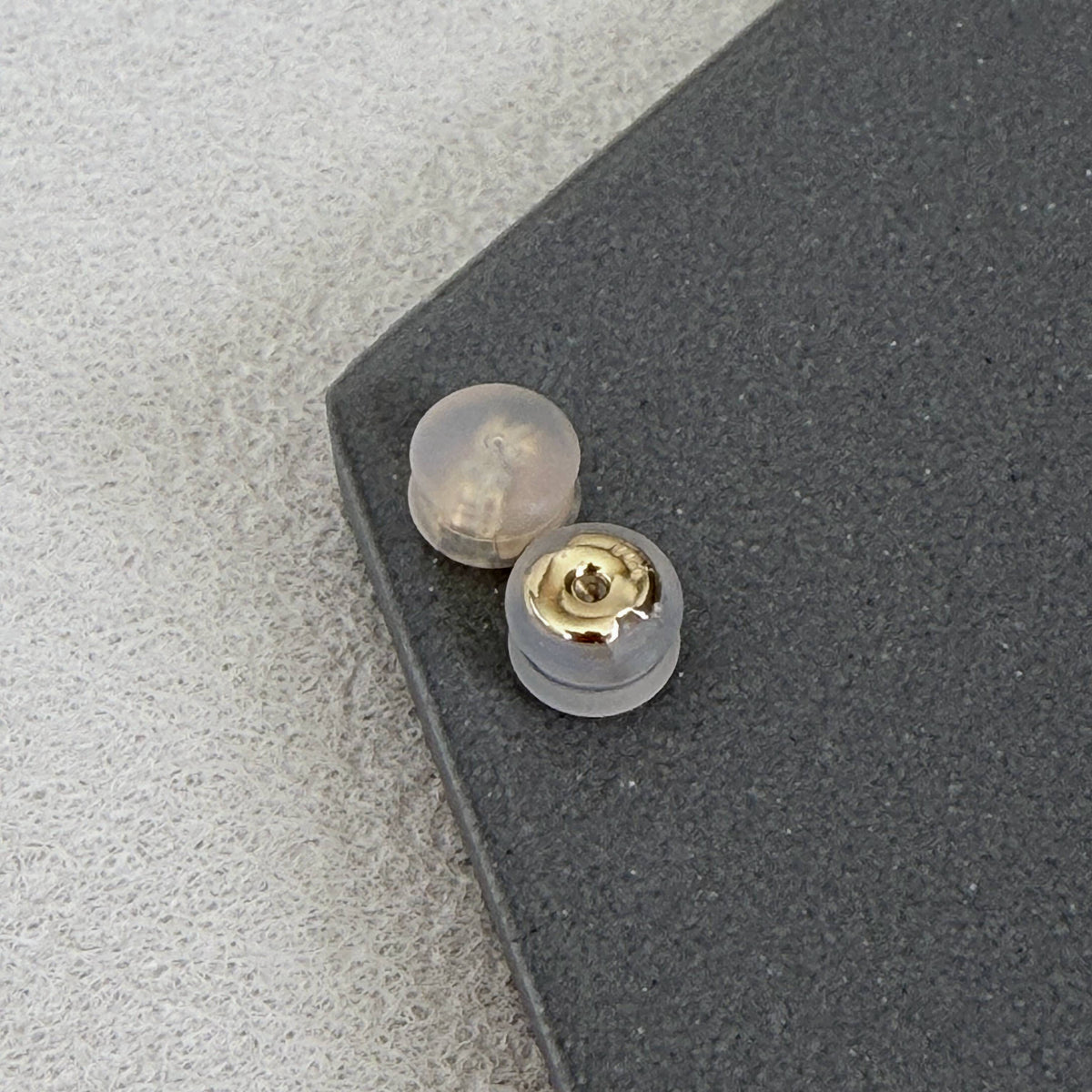 Solid 14K gold silicone earring backs for compatible stud earring posts