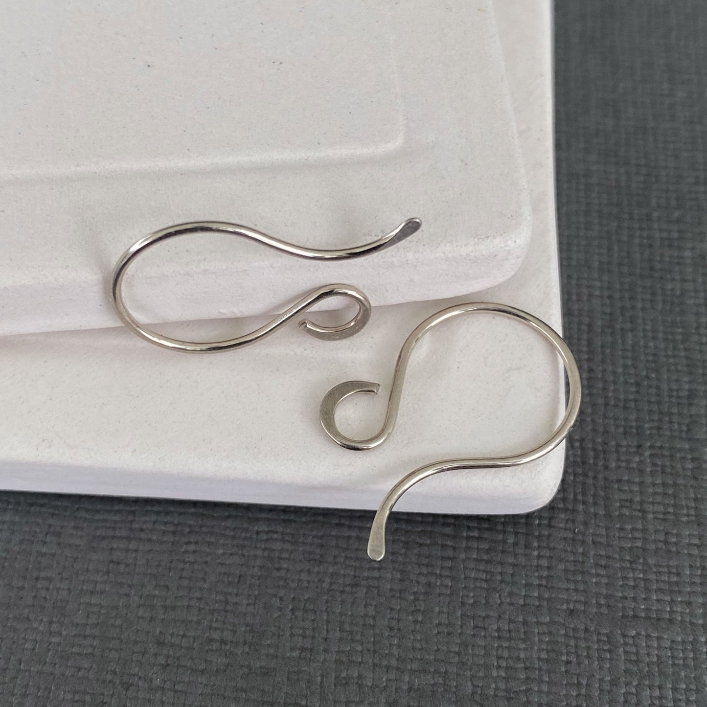 Close-up of handmade 14k Palladium White Gold earring hooks, nickel-free and hypoallergenic