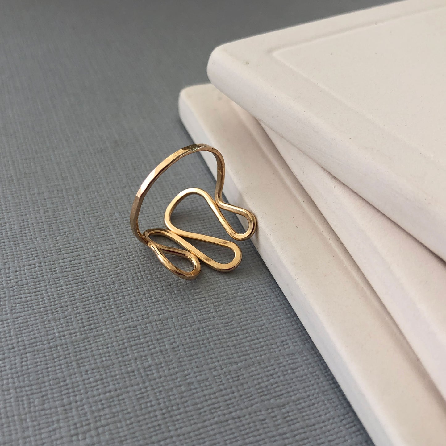 Handmade 14K gold filled wavy ring with a modern, asymmetrical design, slightly adjustable for a comfortable fit—perfect for thumb or statement wear.