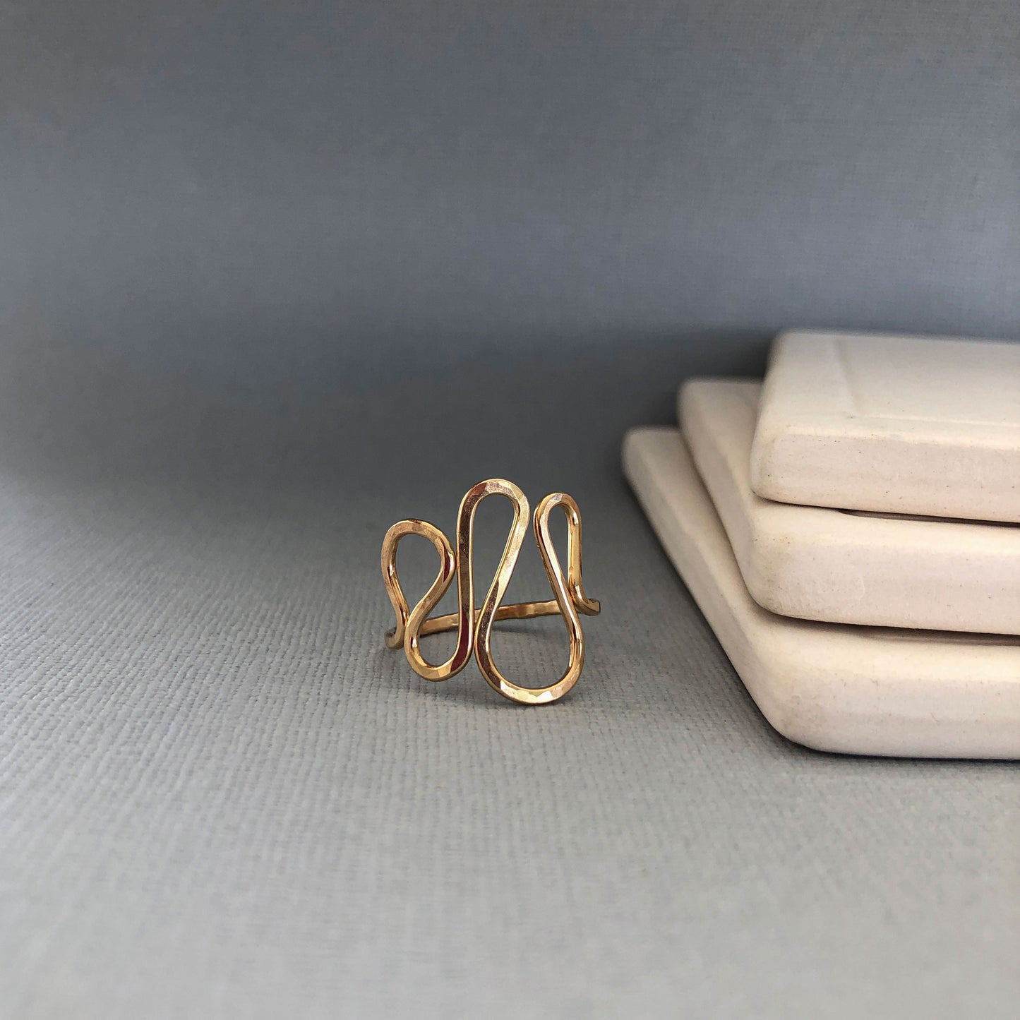 Handmade 14K gold filled wavy ring with a modern, asymmetrical design, slightly adjustable for a comfortable fit—perfect for thumb or statement wear.