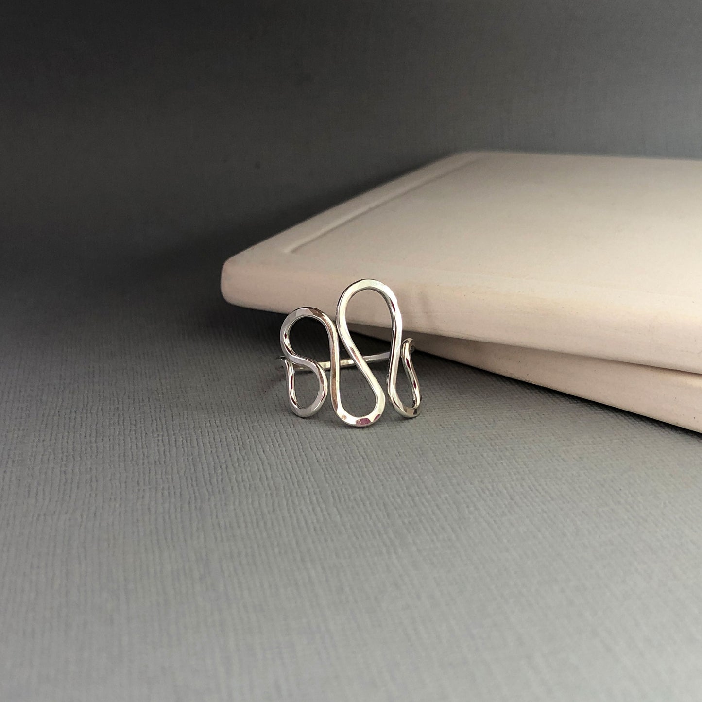 Handmade 14K gold filled wavy ring with a modern, asymmetrical design, slightly adjustable for a comfortable fit—perfect for thumb or statement wear.