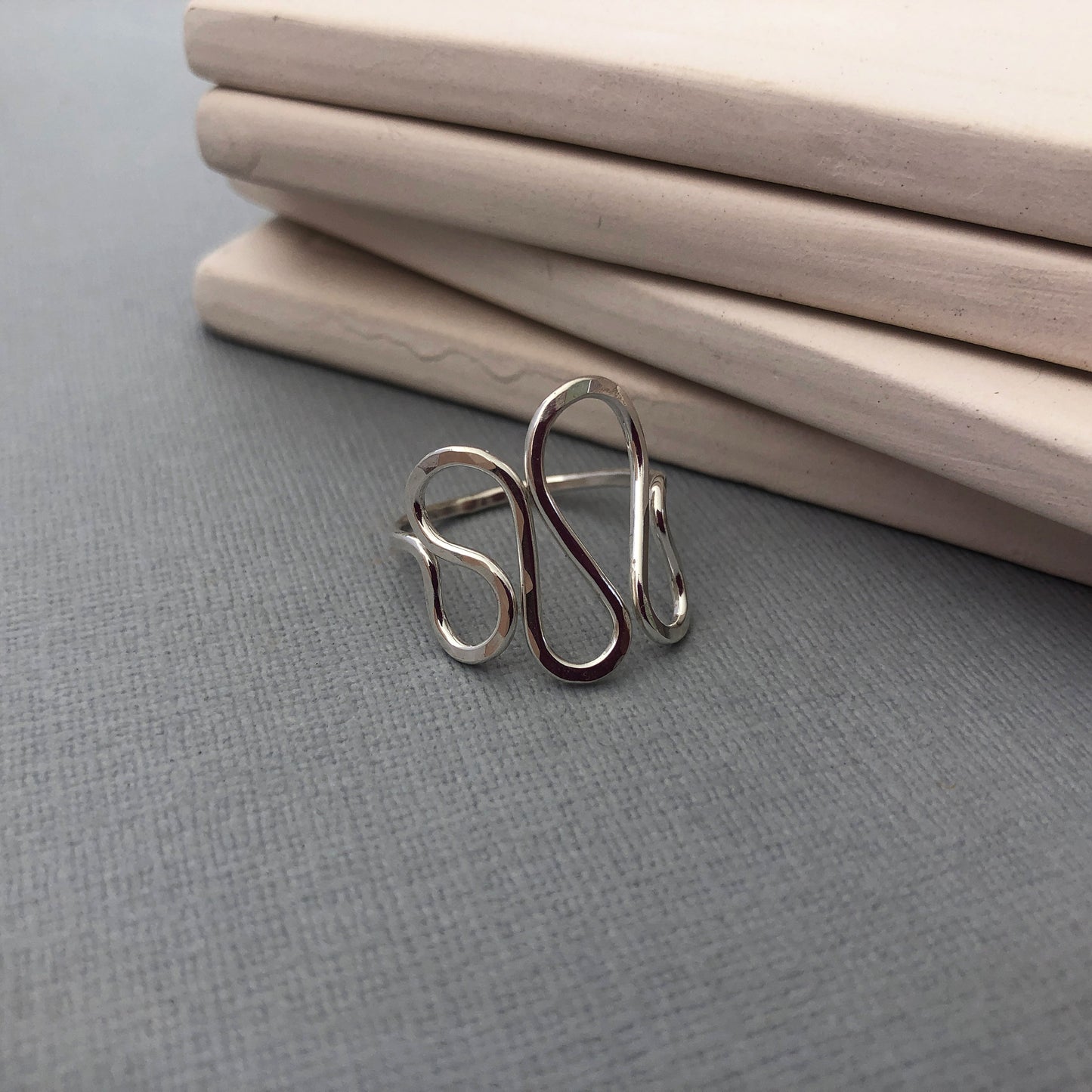 Handmade 14K gold filled wavy ring with a modern, asymmetrical design, slightly adjustable for a comfortable fit—perfect for thumb or statement wear.