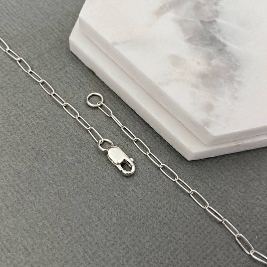 Solid 2mm sterling silver paperclip chain with adjustable links.